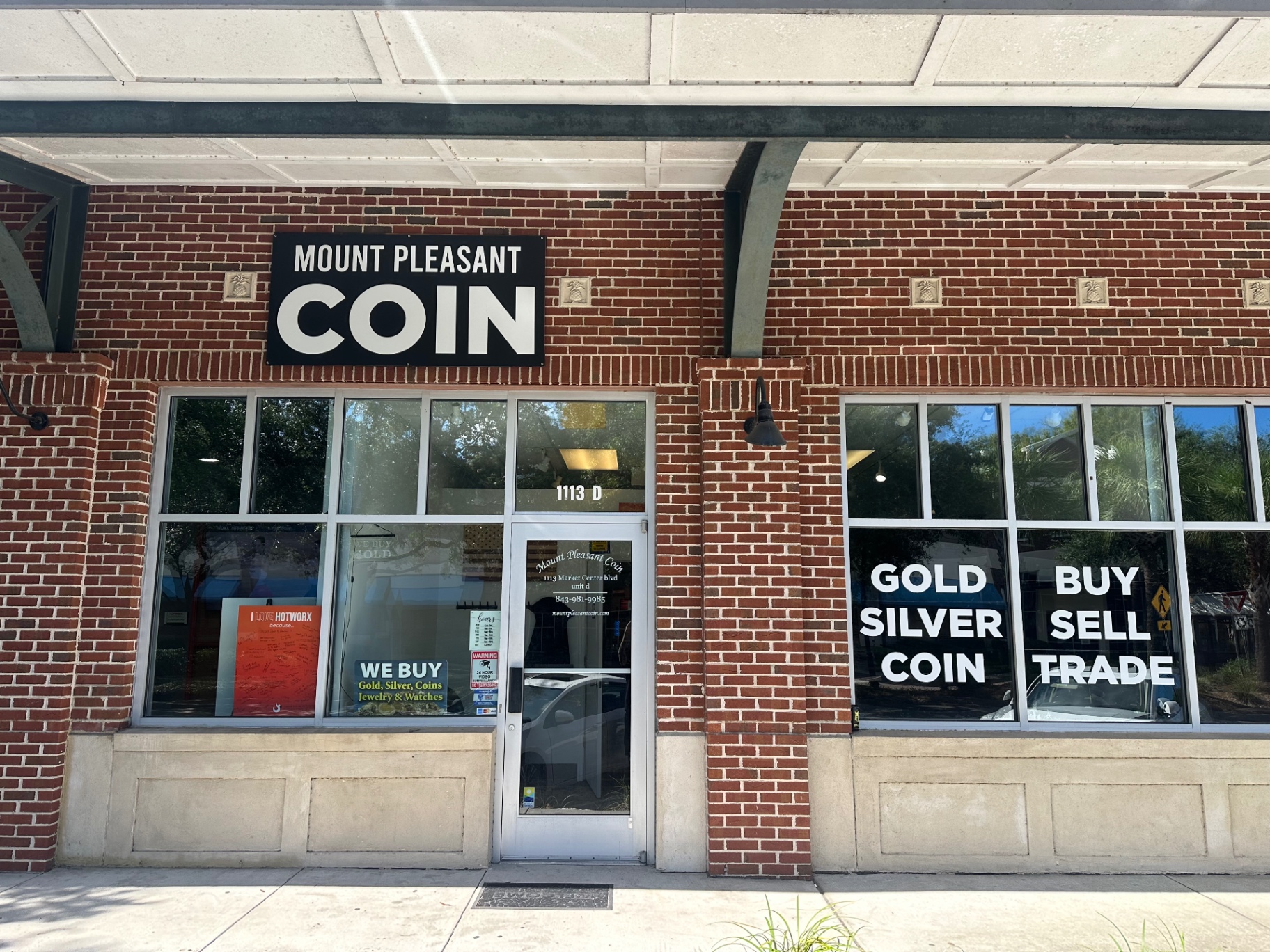 Mount Pleasant Coin storefront on Market Center Blvd, with GOLD SILVER COIN and BUY SELL TRADE window lettering